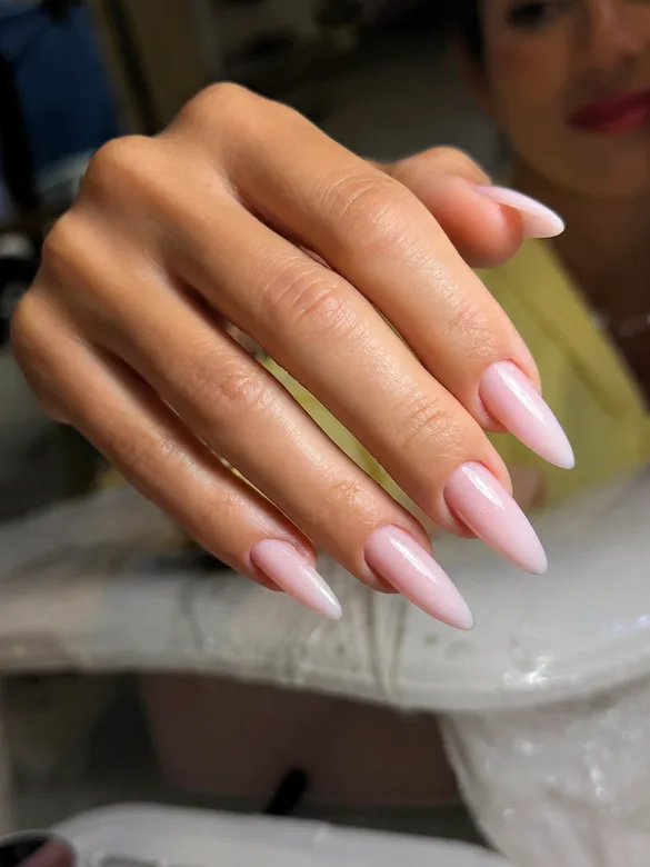 Glazed pink nails with gold hearts